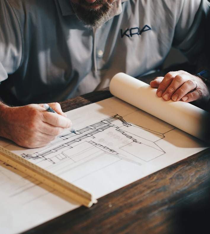 Engineer reviewing drawings on site